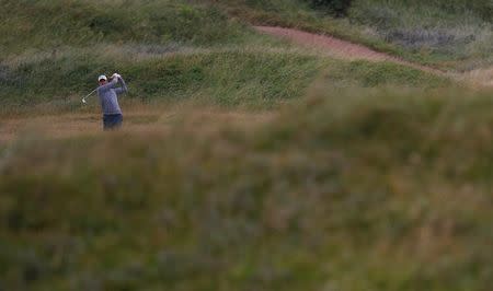 Golf - The 146th Open Championship - Royal Birkdale - Southport, Britain - July 21, 2017 England’s Ian Poulter plays his approach to the third hole during the second round REUTERS/Phil Noble