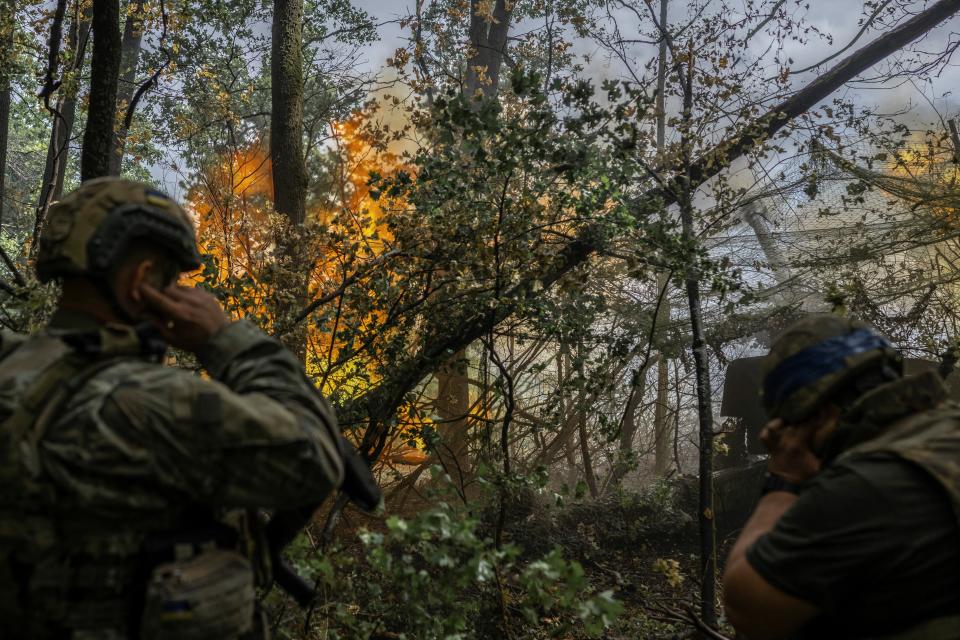 Artillerymen of the 13th Operative Purpose Brigade ‘Khartiia’ of the National Guard of Ukraine fire a howitzer towards Russian troops near Lyptsi in Kharkiv Oblast (REUTERS)