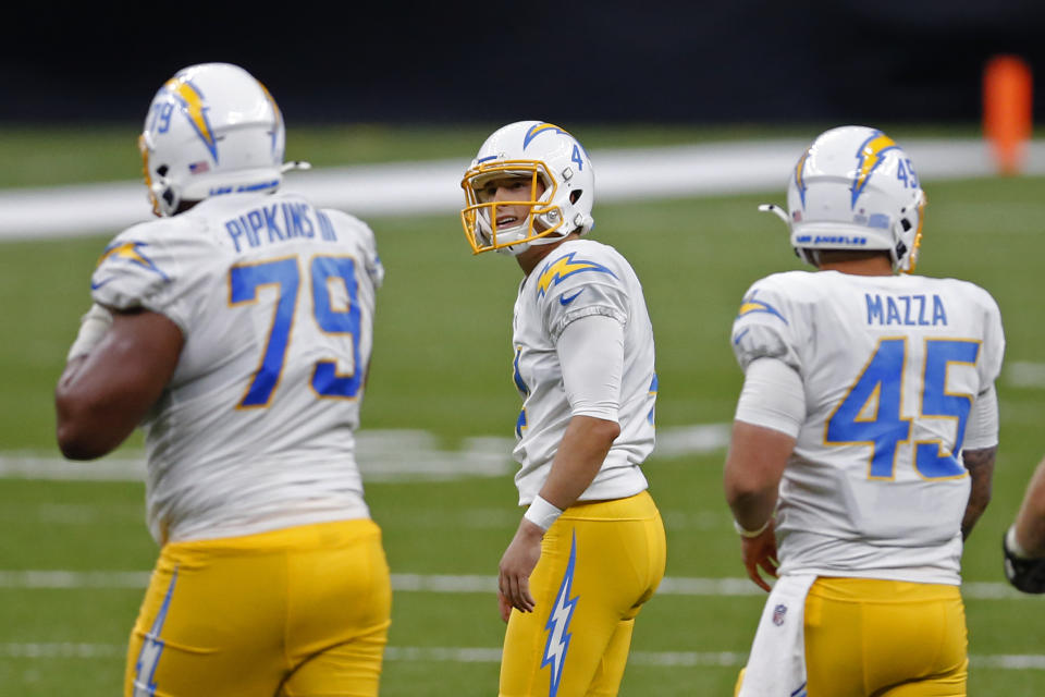 Los Angeles Chargers kicker Mike Badgley (4) reacts after missing a field goal in the second half of an NFL football game against the New Orleans Saints in New Orleans, Monday, Oct. 12, 2020. The Saints won in overtime, 30-27. (AP Photo/Brett Duke)