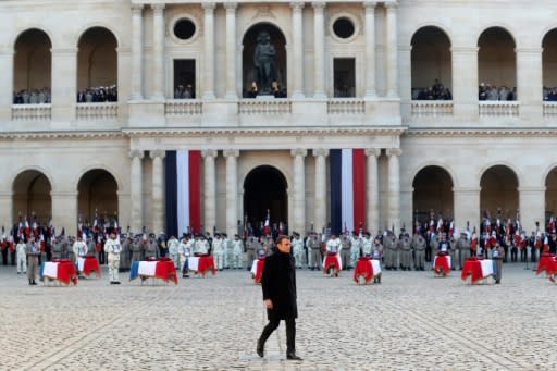 French President Emmanuel Macron said he bowed before the soldiers' 'sacrifice'