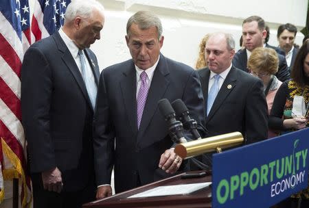 Speaker of the House John Boehner (R-OH) steps to the podium to speak about funding for the Department of Homeland Security during a news conference on Capitol Hill in Washington February 25, 2015. REUTERS/Joshua Roberts