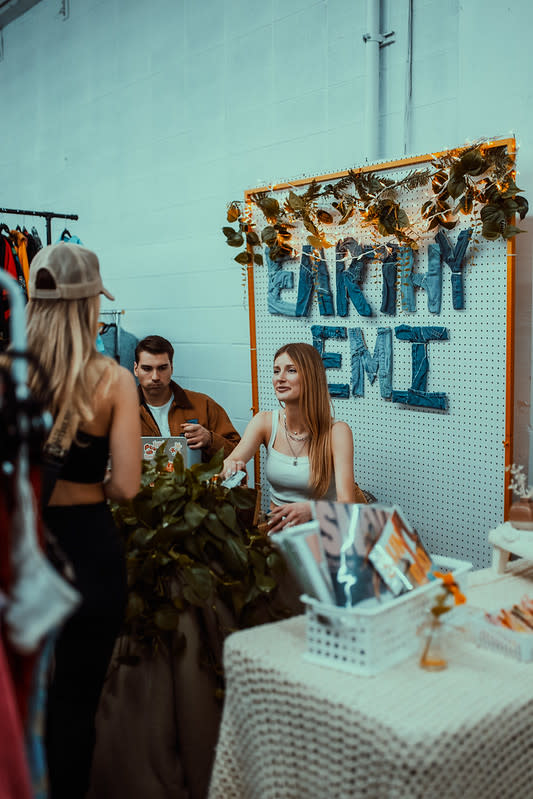 Denver-era fashion designer Earthy Emi sells her vintage pieces at Denver ThriftCon 2023.