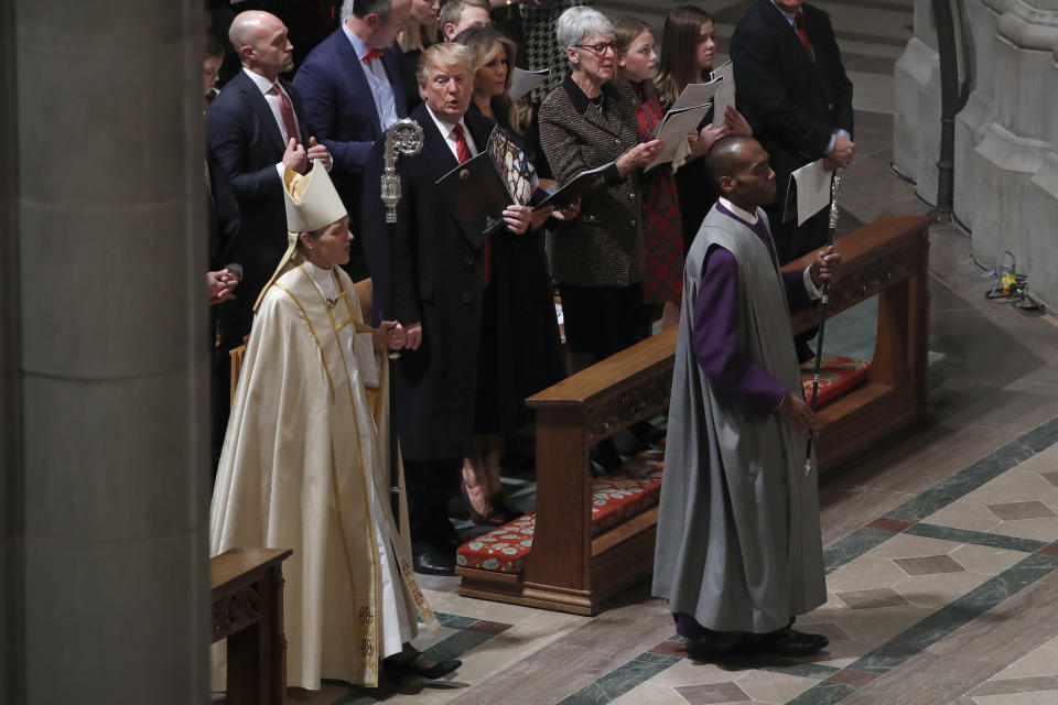 President Donald Trump and first lady Melania Trump attend a Christmas Eve service at the National Cathedral, Monday, Dec. 24, 2018, in Washington. (AP Photo/Jacquelyn Martin)