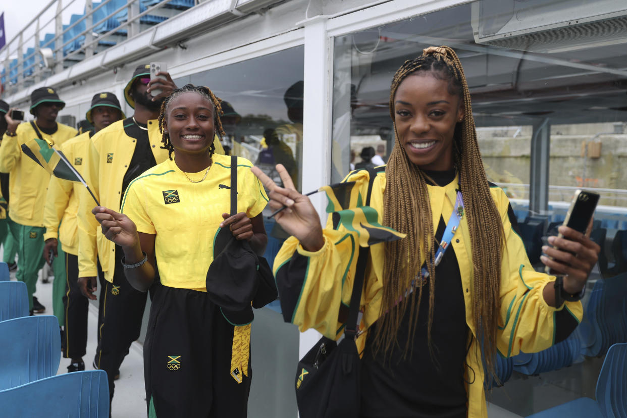 Athletes of Jamaica board a boat prior to the opening ceremony for the 2024 Summer Olympics. / Credit: Michael Reaves / AP