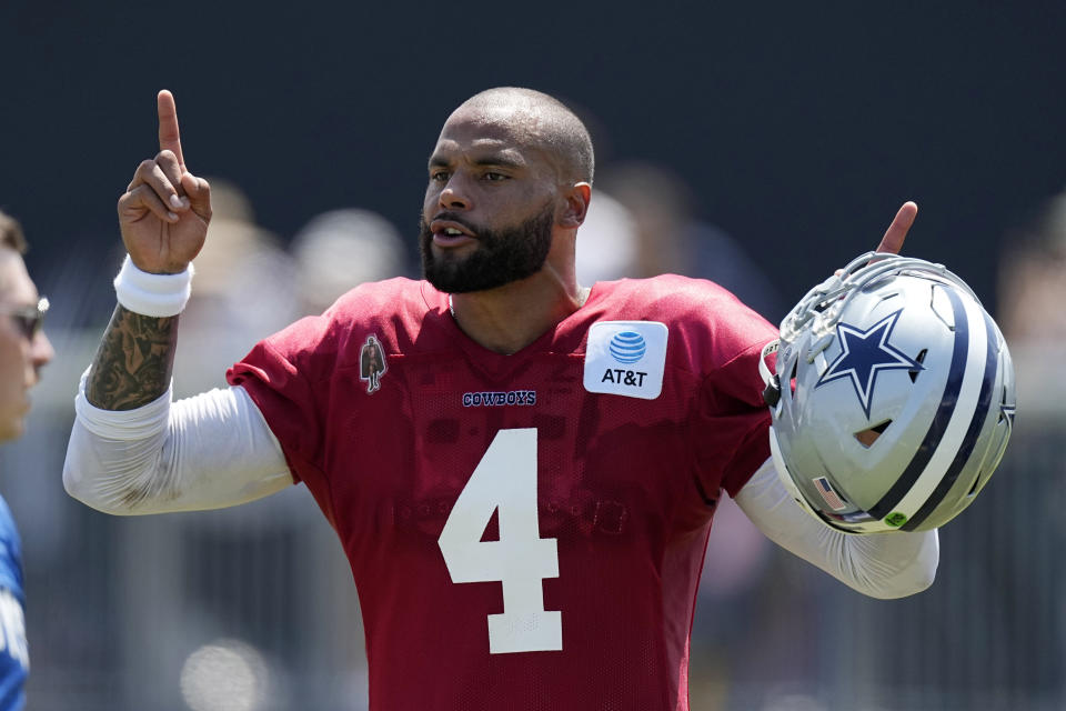 Dallas Cowboys quarterback Dak Prescott gestures during the NFL football team's training camp Monday, July 31, 2023, in Oxnard, Calif. (AP Photo/Mark J. Terrill)