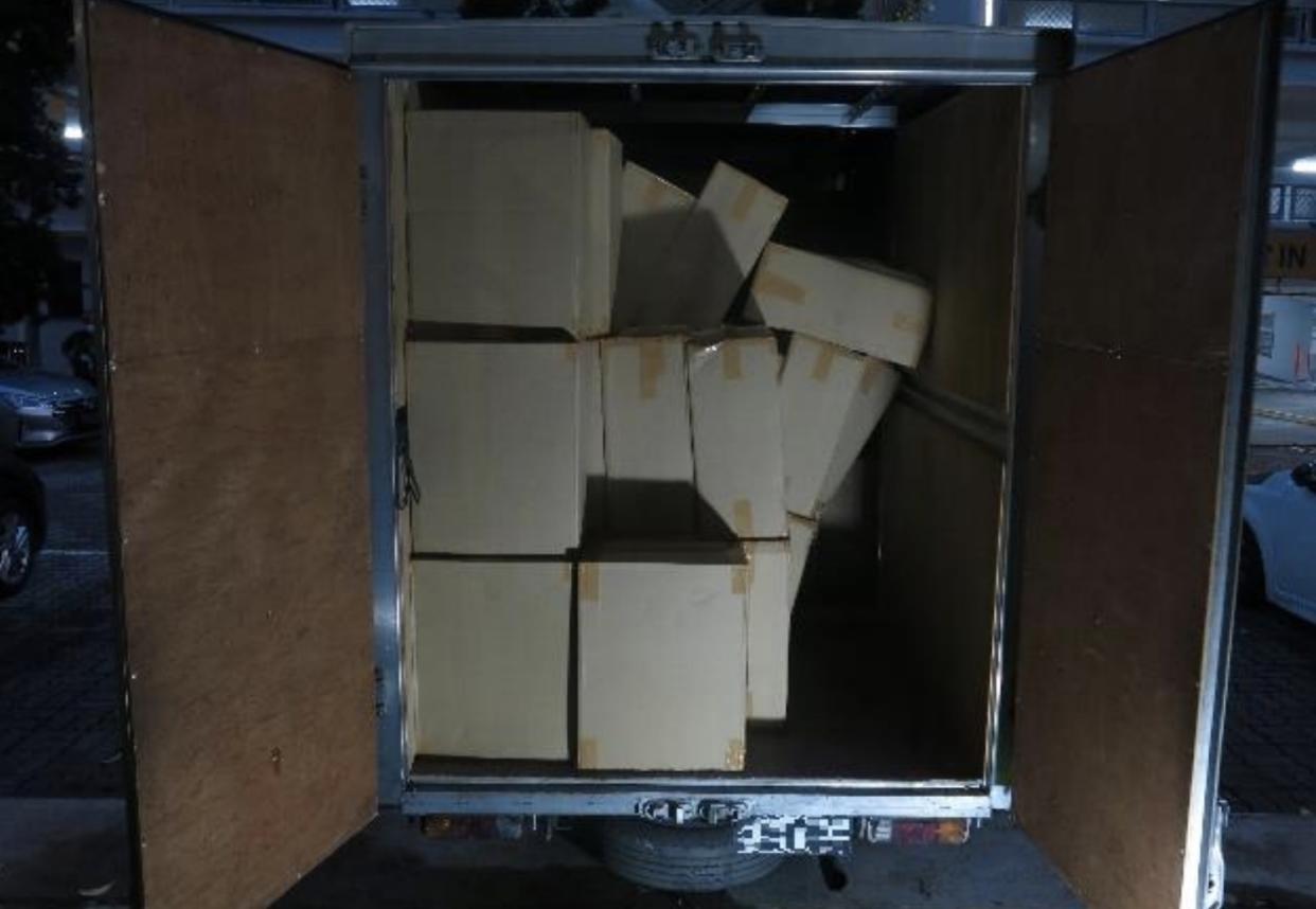 Singapore Customs seizes duty-unpaid cigarettes from a truck at a carpark at Lorong 8 Toa Payoh. (PHOTO: Singapore Customs)