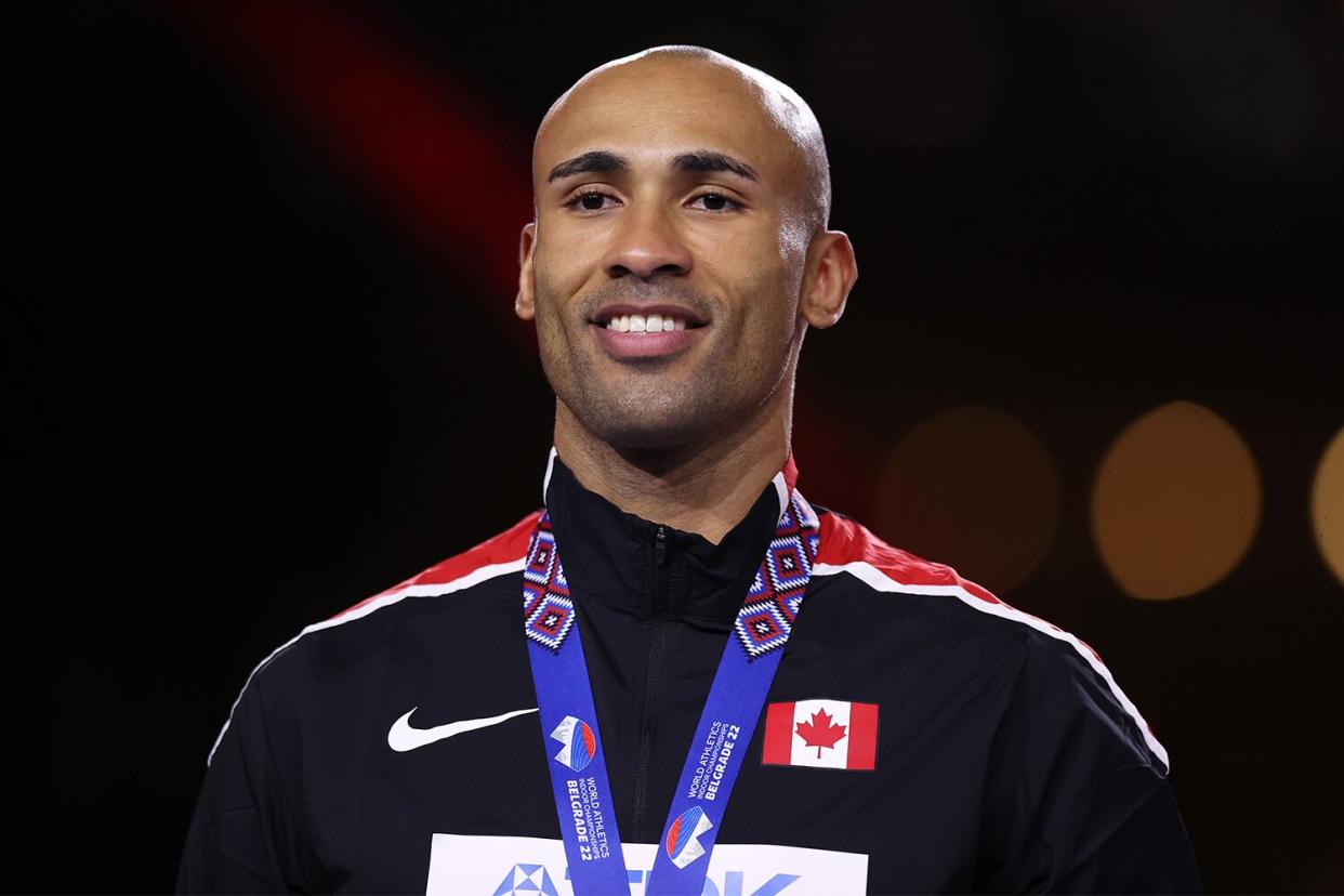 Gold Medallist Damian Warner of Canada pose following the Men's Heptathlon during Day Two of the World Athletics Indoor Championships at Belgrade Arena on March 19, 2022 in Belgrade, Serbia