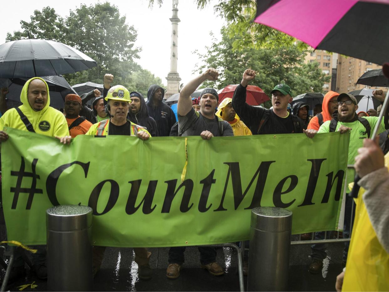 Construction workers and union members hold a rally in New York City ahead of the Supreme Court ruling in the Janus v. AFSCME case, which gave government workers nationwide the choice of opting out of paying union fees even if they benefit from the union's contract negotiations: Drew Angerer/Getty Images