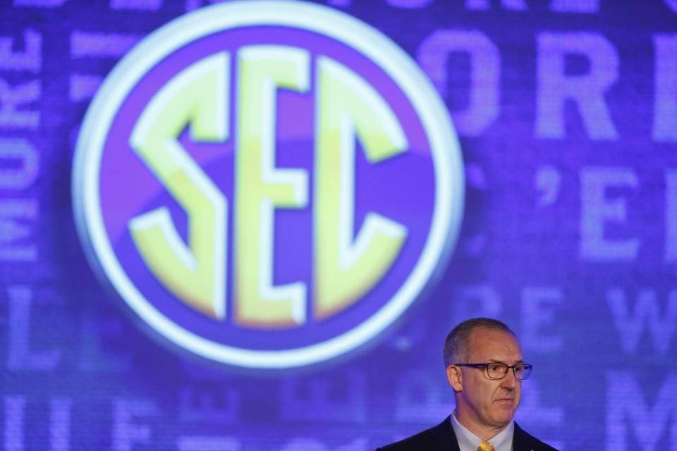 Southeastern Conference commissioner, Greg Sankey, speaks to the media at the Southeastern Conference NCAA college football media days, Monday, July 11, 2016, in Hoover, Ala. (AP Photo/Brynn Anderson)