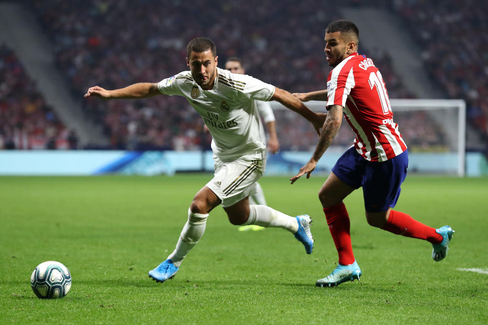 Eden Hazard (left) and Real Madrid couldn't make a dent on the scoreboard, and neither could Angel Correa and Atletico Madrid. (Getty)