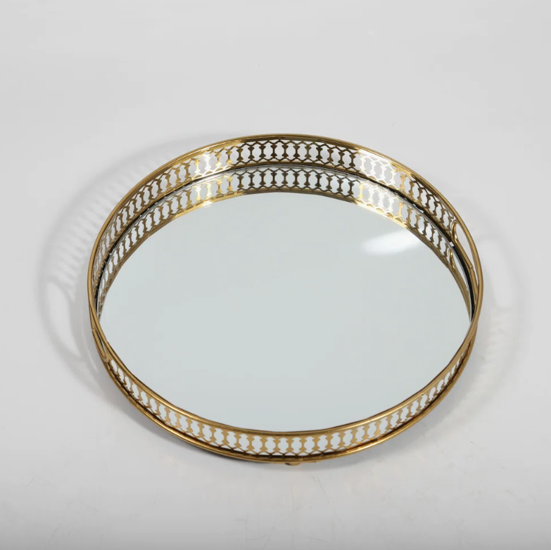 <p><a href="https://go.redirectingat.com?id=74968X1596630&url=https%3A%2F%2Fwww.wayfair.com%2F--%2Fpdp%2Feverly-quinn--vintage-metal-round-mirror-surface-tray-x119108361-l6371-w008097250.html&sref=https%3A%2F%2Fwww.housebeautiful.com%2Fshopping%2Fg60662357%2Fshop-and-tell-what-designers-buy-at-wayfair%2F" rel="nofollow noopener" target="_blank" data-ylk="slk:Shop Now;elm:context_link;itc:0;sec:content-canvas" class="link ">Shop Now</a></p><p>Vintage Metal Round Mirror Surface Tray</p><p>wayfair.com</p><p>$34.99</p>