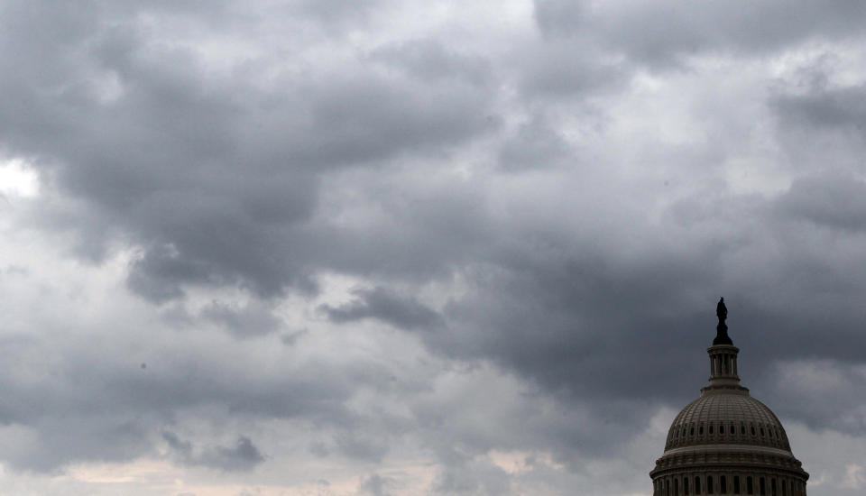 Dark clouds surround the Capitol dome on Capitol Hill in Washington, Friday, June 1, 2012, as severe weather comes to the area. (AP Photo/Alex Brandon)