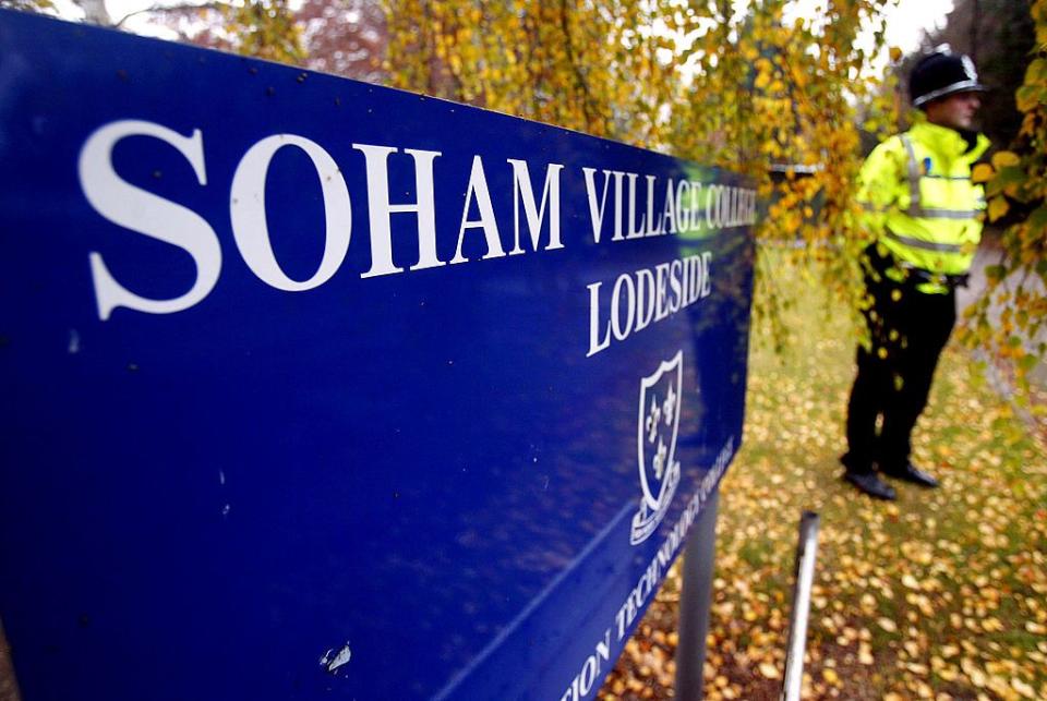 soham, england november 10 police stand outside soham school november 10, 2003 in soham, england out of court visit in the trial of former school caretaker ian huntley, 29, charged with the abduction and murder of 10 year olds holly wells and jessica chapman, and his girlfriend maxine carr, a 26 year old former classroom assistant, charged with attempting to pervert the course of justice and assisting an offender photo by graeme robertsongetty images