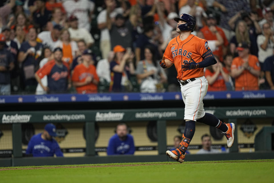 Houston Astros' Chas McCormick runs down the third base line after hitting a three-run home run against the Kansas City Royals during the eighth inning of a baseball game Friday, Sept. 22, 2023, in Houston. (AP Photo/David J. Phillip)
