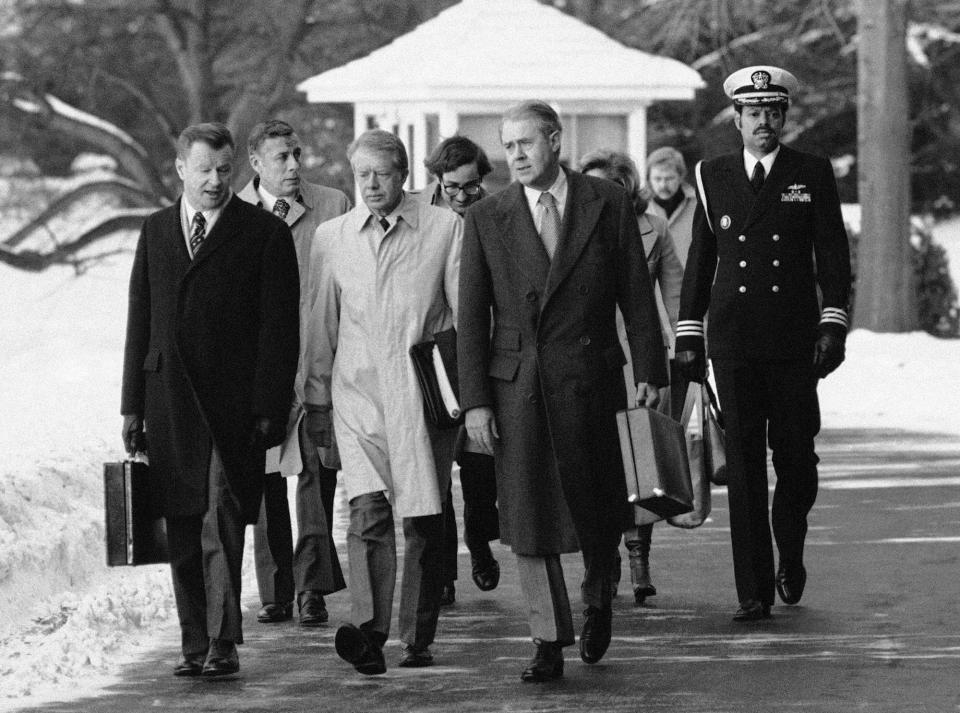 Pres. Jimmy Carter, Zbigniew Brzezinski and Cyrus Vance, Feb. 14, 1979