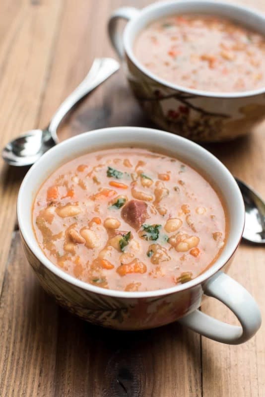 <p>From Valeries Kitchen</p><p>This is a classic soup recipe that will take you right back to Grandma's kitchen.</p><p><strong>Get the Recipe: <a href="https://www.fromvalerieskitchen.com/slow-cooker-ham-and-bean-soup/" rel="nofollow noopener" target="_blank" data-ylk="slk:Crock Pot Ham and Bean Soup;elm:context_link;itc:0;sec:content-canvas" class="link ">Crock Pot Ham and Bean Soup</a></strong></p>