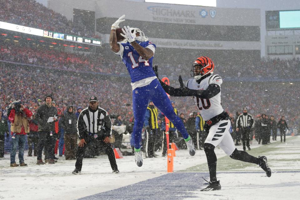 Cincinnati Bengals cornerback Eli Apple defends a pass intended for Buffalo Bills wide receiver Stefon Diggs during the second half of the NFL division round football game in Orchard Park.