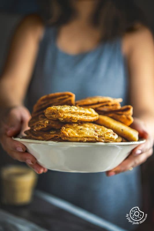 <p>My Ginger Garlic Kitchen</p><p>They make a crunchy and crispy tea-time Indian snack when paired with hot masala chai or coffee.</p><p><strong>Get the recipe here: <a href="https://www.mygingergarlickitchen.com/cheese-garlic-masala-mathri/" rel="nofollow noopener" target="_blank" data-ylk="slk:Cheese Garlic Masala Mathri;elm:context_link;itc:0;sec:content-canvas" class="link ">Cheese Garlic Masala Mathri</a></strong></p>