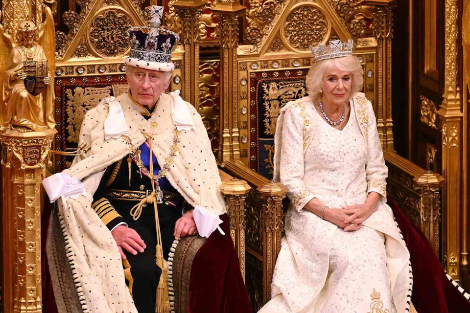 <p>LEON NEAL/POOL/AFP via Getty Images</p> King Charles and Queen Camilla at the State Opening of Parliament on Nov. 7, 2023
