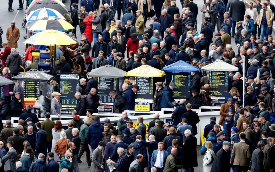 General view as racegoers place bets ahead of today's races Action