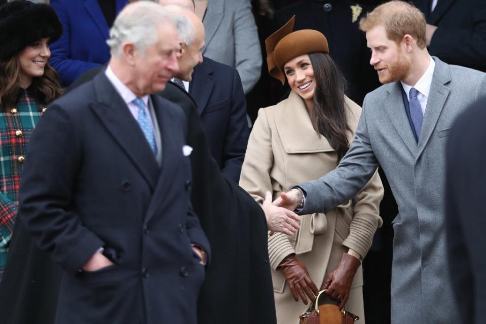 King Charles III with Meghan Markle and Prince Harry in London on Christmas Day 2017. Getty Images