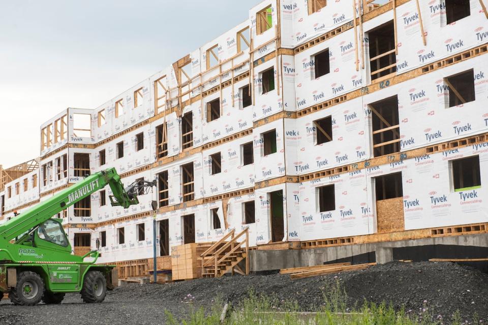 An apartment building is under construction on Manhattan Drive in Fredericton, Wednesday, July 5, 2023. The New Brunswick government has amassed nearly $41 million in security deposits collected from residential tenants in a practice that is unique in Canada and that critics say needs to change.