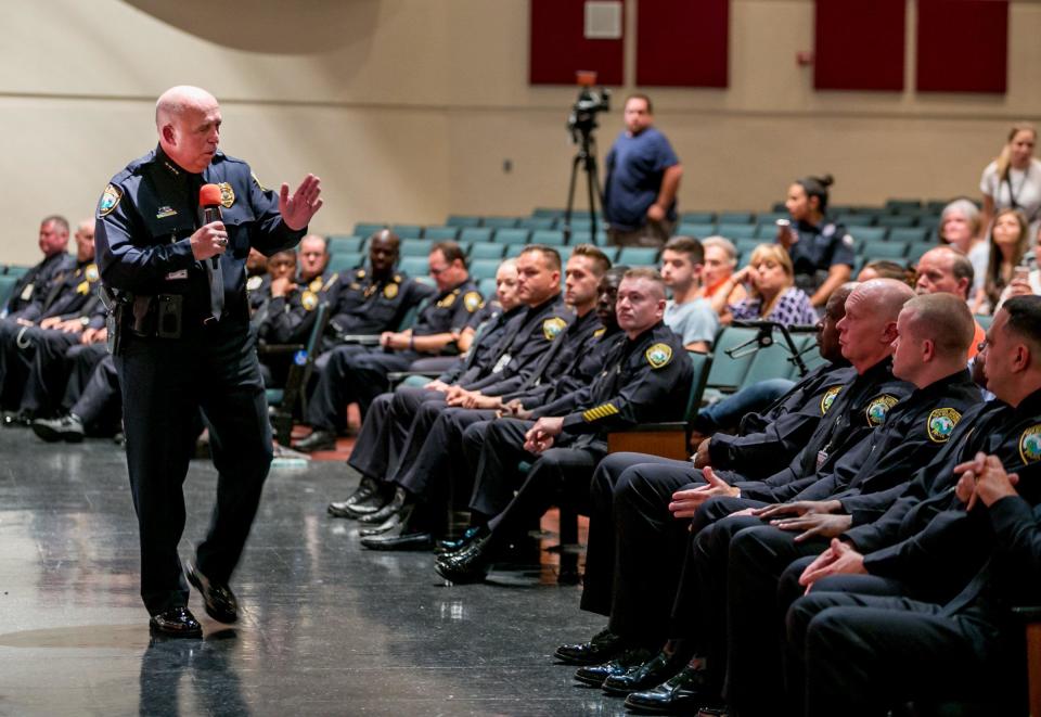 Chief Frank Kitzerow speaks to new Palm Beach County school district officers before swearing them in last year.