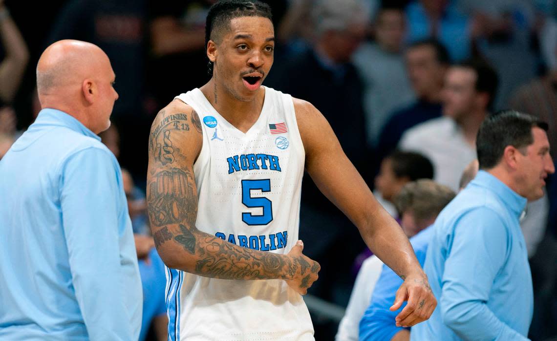 North Carolina’s Armando Bacot (5) celebrates the Tar Heels’ 85-69 victory over Michigan State on Saturday, March 23, 2024, in the second round of the NCAA Tournament at Spectrum Center in Charlotte, N.C.