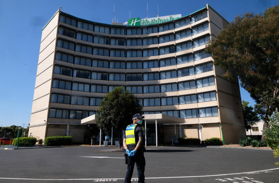 Quarantining hotel guest at the Holiday Inn near the  Airport are moved to a new location in Melbourne. Source: AAP