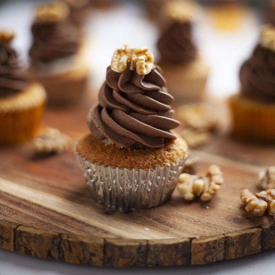 <p>We’ve turned the classic British confectionary into a cupcake for adults and kids alike to enjoy. </p><p><strong>Recipe: <a href="https://www.goodhousekeeping.com/uk/food/recipes/a30468897/walnut-whip-cupcakes/" rel="nofollow noopener" target="_blank" data-ylk="slk:Walnut Whip cupcakes;elm:context_link;itc:0;sec:content-canvas" class="link ">Walnut Whip cupcakes</a></strong></p>