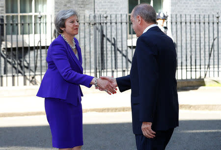 Britain's Prime Minister Theresa May greets Turkey's President Recep Tayyip Erdogan outside 10 Downing Street in London, May 15, 2018. REUTERS/Phil Noble