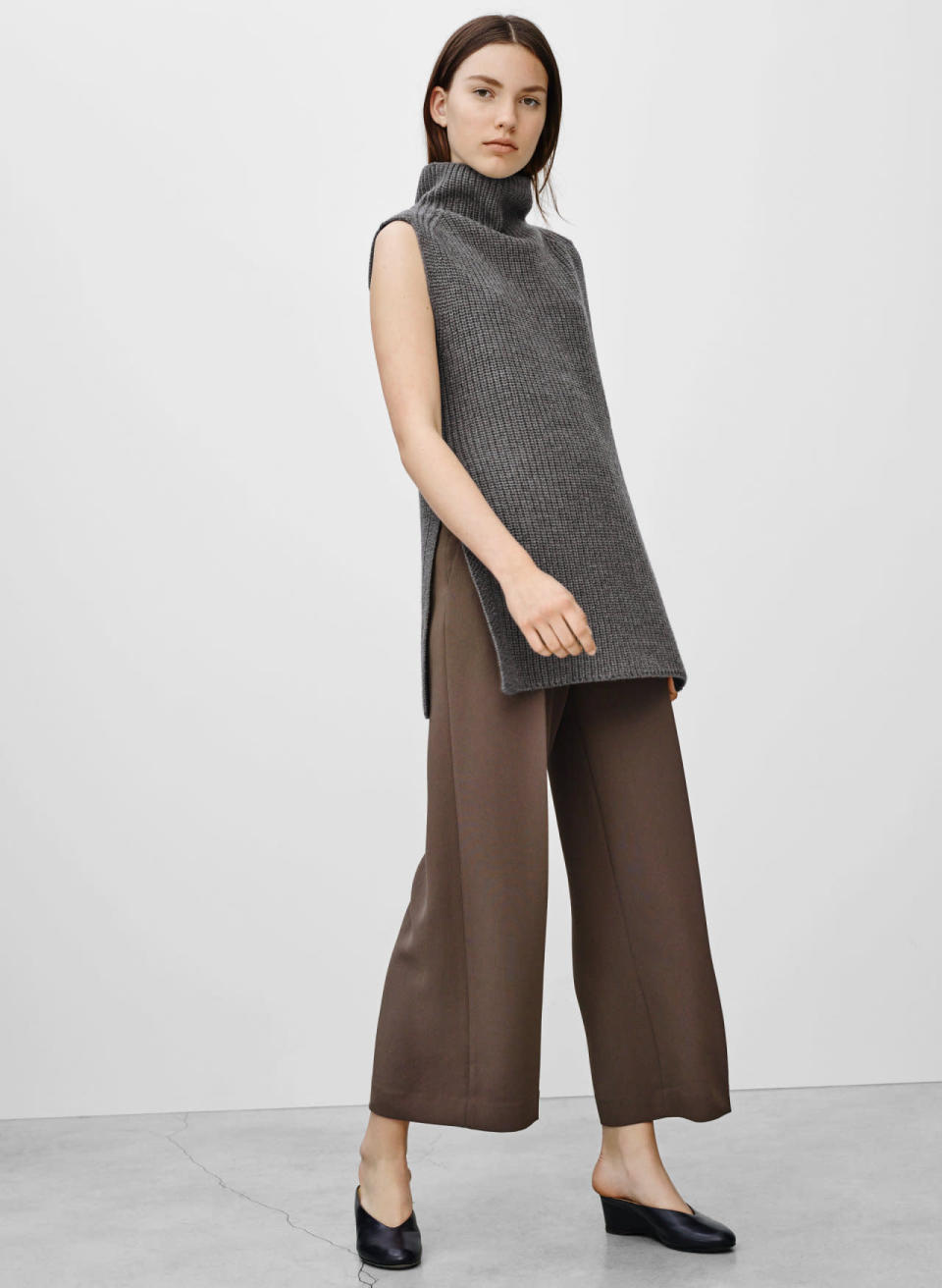 Pair a swingy turtleneck sweater with wide-leg cropped pants for a look that’s understatedly luxurious.