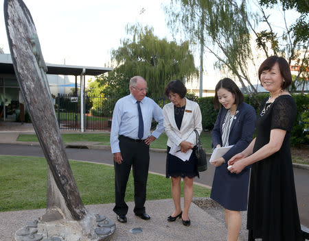 Akie Abe, right, wife of Japan's Prime Minister Shinzo Abe, smiles as she looks at a salvaged propellor that is part of an exhibition about the Japanese company responsible for clearing Darwin Harbour of shipwrecks after World War II during a tour at the Darwin Uniting Memorial Church in Darwin, Australia, November 16, 2018. Rick Rycroft/Pool via REUTERS