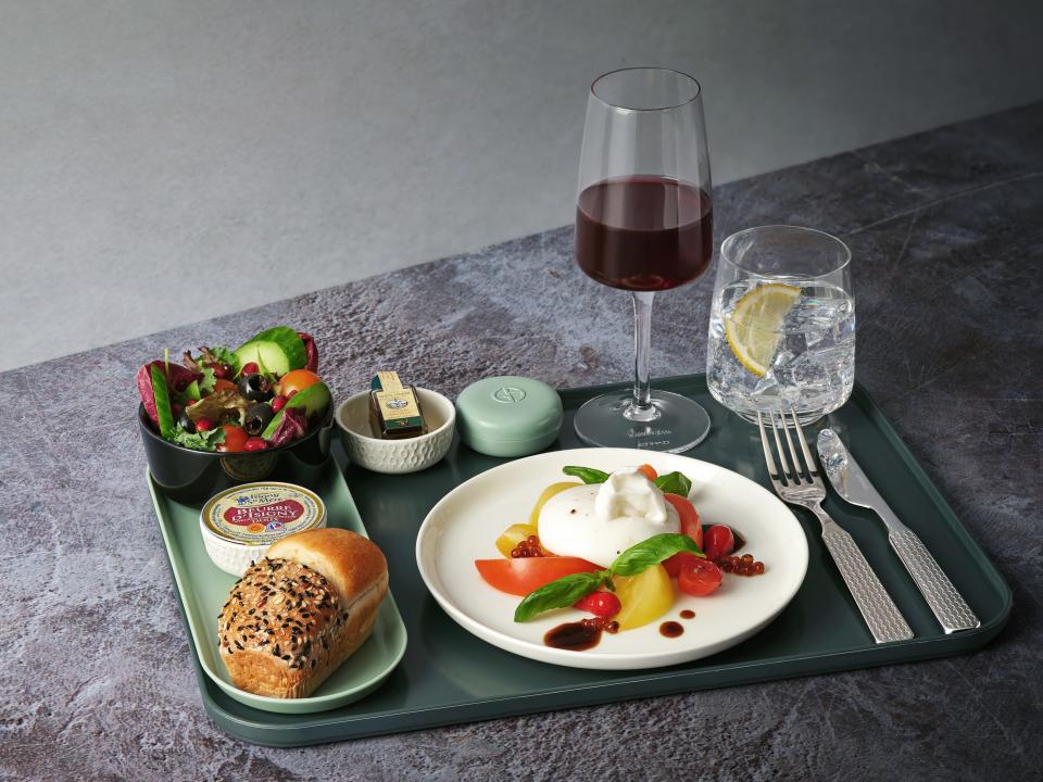 Etihad's “dine anytime” service offers three-course meals, and utilizes silverware and slip-proof materials