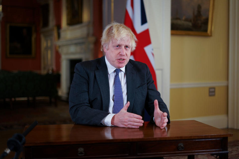 British Prime Minister Boris Johnson addresses the public to provide an update on the Covid-19 booster programme, at Downing Street in London, England. 