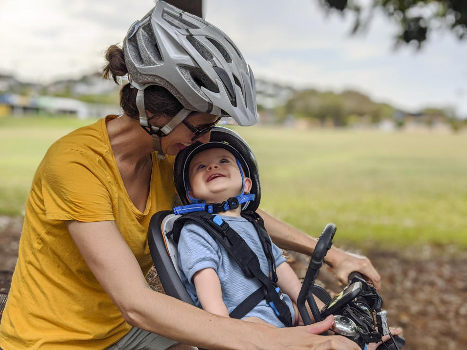Mother and son riding bike together. Source: Getty Images