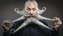 <p>Aarne Bielefeld attends the fourth British Beard and Moustache Championships at the Empress Ballroom, Winter Gardens, Blackpool. (PA Images) </p>
