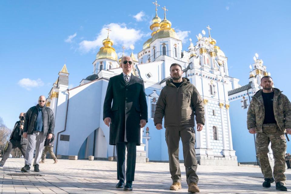 President Joe Biden walks with Ukrainian President Volodymyr Zelenskyy at St. Michael's Golden-Domed Cathedral on a surprise visit, Monday, Feb. 20, 2023, in Kyiv. (AP)