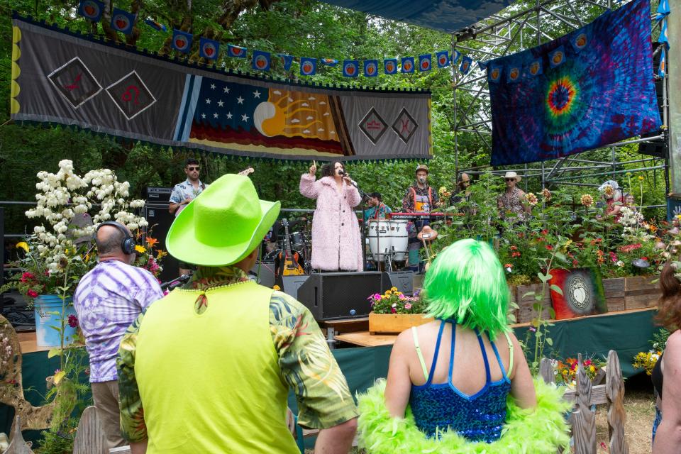 Reb & The Good News preform on the Main Stage on the first day of the Oregon Country Fair near Veneta on July 7, 2023.