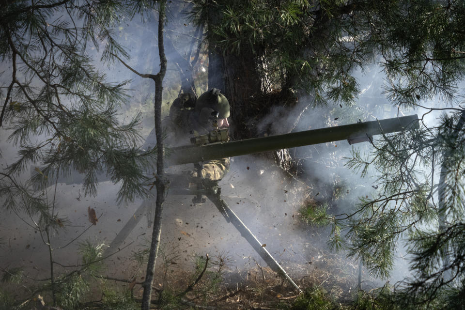 Soldiers of Ukraine's National Guard 1st brigade Bureviy (Hurricane) fire a recoilless cannon during combat training at a military training ground in the north of Ukraine Friday, Nov. 3, 2023. (AP Photo/Efrem Lukatsky)