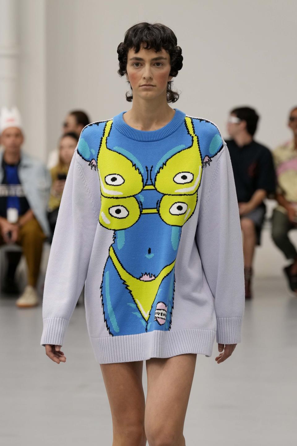 A model wears a creation as part of the Jeffrey Loverboy men's Spring Summer 2024 collection presented in Milan, Italy, Sunday, June 18, 2023. (AP Photo/Antonio Calanni)