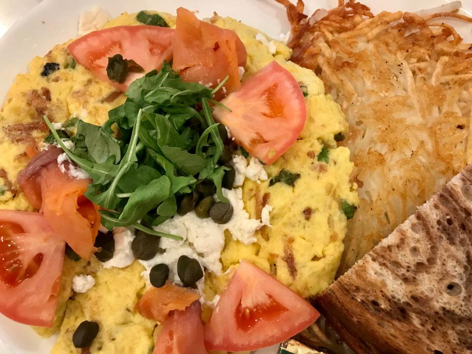 Good Eats Cafe in Pewaukee makes a frittata with smoked salmon, goat cheese and capers, garnished with tomato and arugula. Well-crisped hash browns can be added for $2.