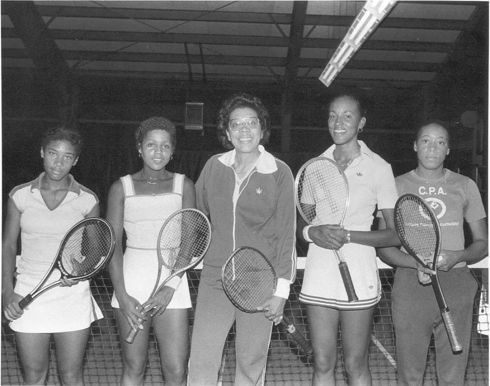 L-R: Zina Garrison, Andrea Buchanan, tennis great Althea Gibson, Leslie Allen and Kim Sands trained as a cohort at the Sportsmen’s Tennis Club in Dorchester, Mass. in the late 1980’s. The facility was the only Black-owned tennis club at the time. Gibson asked the young players about their individual tennis goals.