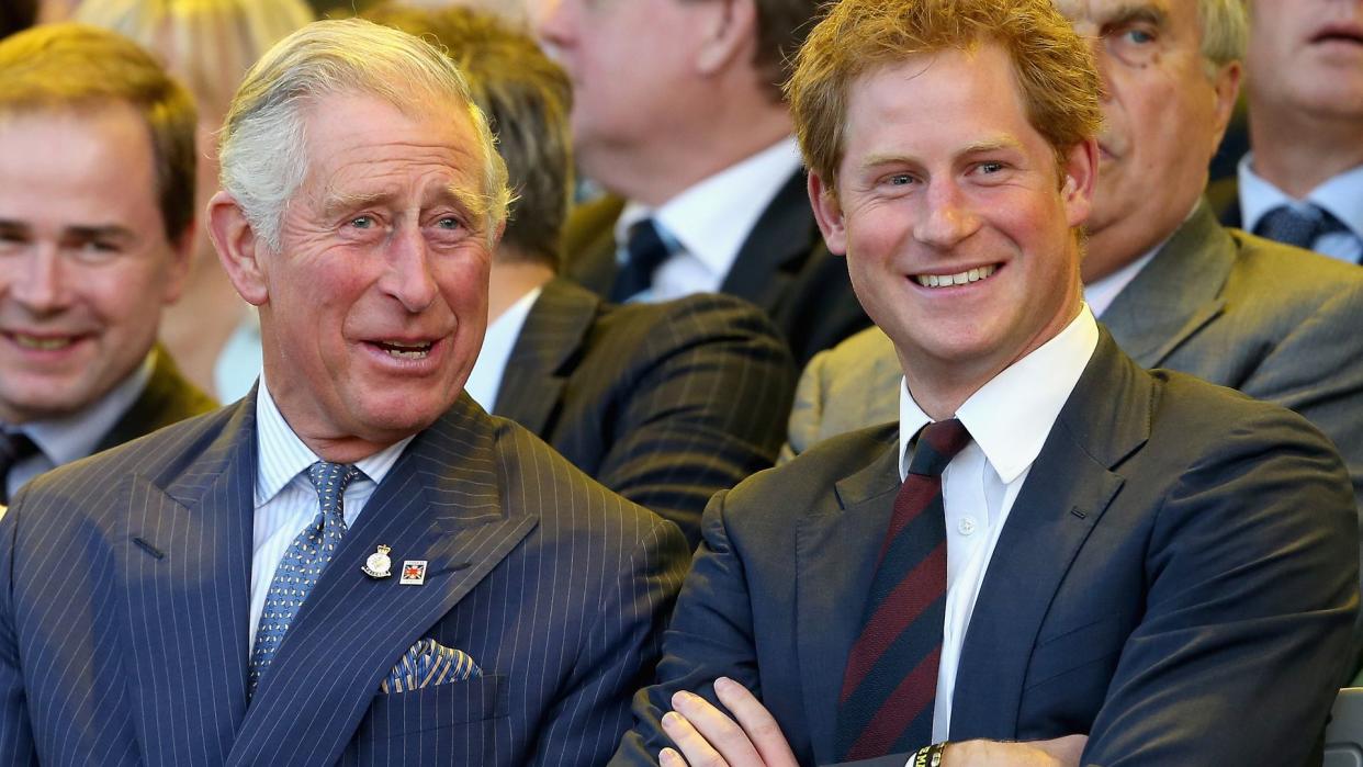 Giddy King Charles spends time with his smiling son Prince Harry