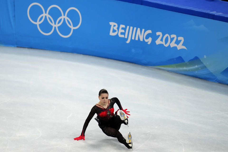 FILE - Kamila Valieva, of the Russian Olympic Committee, falls in the women's free skate program during the figure skating competition at the 2022 Winter Olympics, Thursday, Feb. 17, 2022, in Beijing. No 15-year-old figure skaters will be allowed to compete at the 2026 Olympics following the controversy surrounding Russian competitor Kamila Valieva at this year's Beijing Games. A new age limit for figure skaters at senior international events was passed Tuesday, June 7, 2022 by the International Skating Union in a 110-16 vote that will raise the minimum age to 17 before the next Winter Olympics in Milan-Cortina d’Ampezzo, Italy. (AP Photo/Natacha Pisarenko, File)
