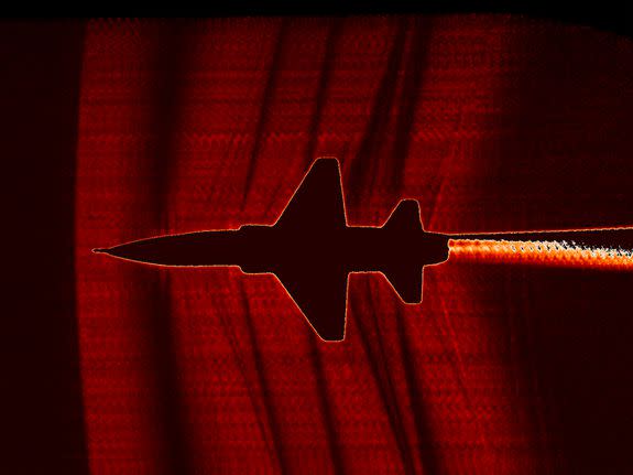 NASA uses cameras with special filters (hydrogen alpha) to capture images of how supersonic planes move through the air and create booms.