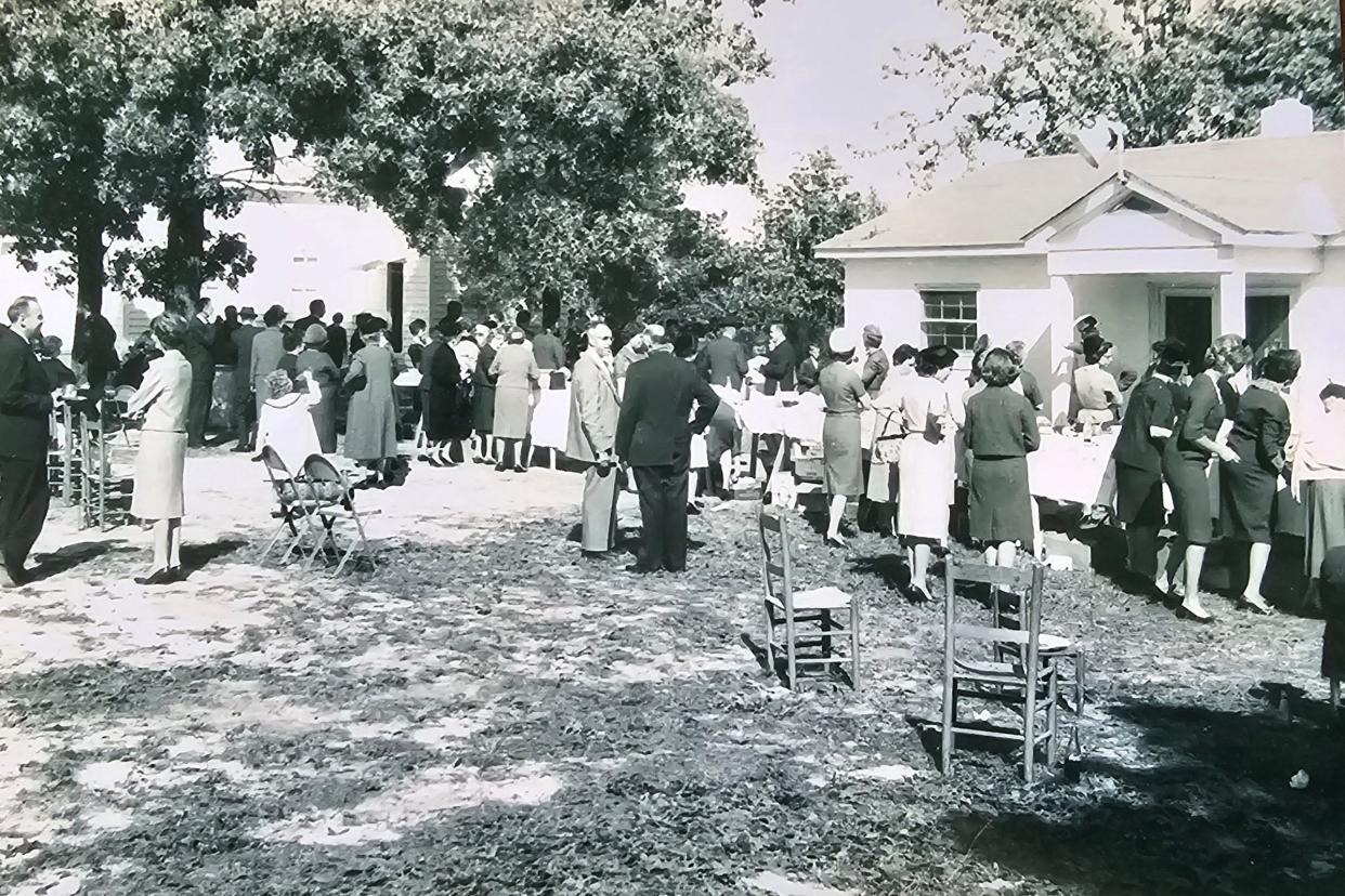 St. Andrews United Methodist Church off Ramsey Street will celebrate its 175th anniversary on Sunday. The picture shows a potluck held on church grounds, circa 1960s.