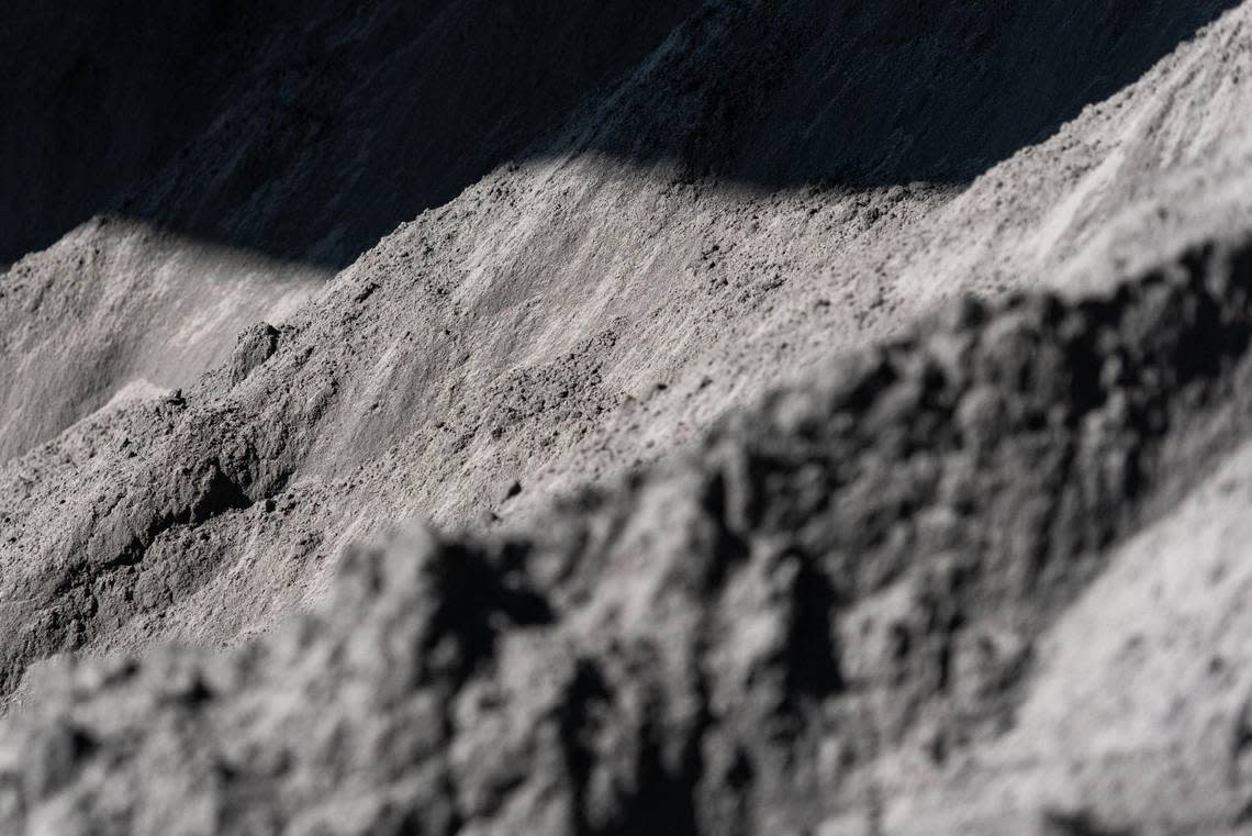 Wet coal ash sits in heaps inside a covered structure at the Salisbury plant.