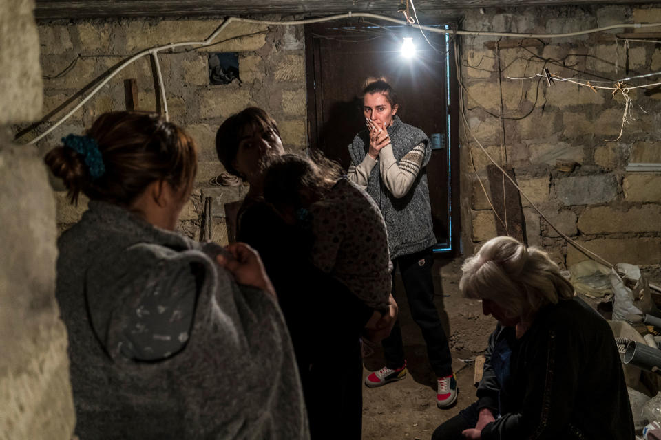 Residents shelter in a basement as air raid sirens sound on Sept. 29, 2020 in Stepanakert, Nagorno-Karabakh.<span class="copyright">Brendan Hoffman—Getty Images</span>