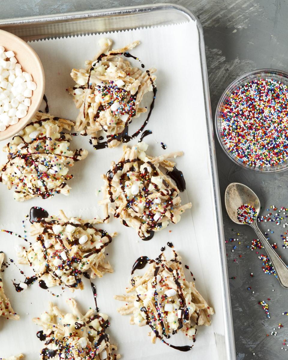 <p>If you're going to emulate Buddy's spaghetti breakfast from the movie Elf, you might as well make it actually edible (and delish). These no-bake cookies are the perfect treat and include all the main food groups. We love taking these to cookie exchanges to switch things up!</p><p>Get the <strong><a href="https://www.delish.com/cooking/recipe-ideas/recipes/a50400/buddy-the-elf-cookies-recipe/" rel="nofollow noopener" target="_blank" data-ylk="slk:Buddy the Elf Cookies recipe;elm:context_link;itc:0;sec:content-canvas" class="link ">Buddy the Elf Cookies recipe</a></strong>.</p>